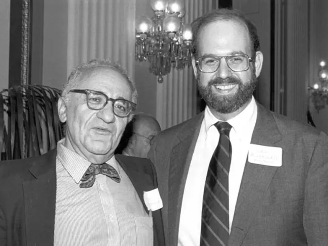 Murray Rothbard and Lew Rockwell, 1983